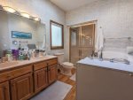 Primary Bathroom with Walk-in Shower & Dual Sinks